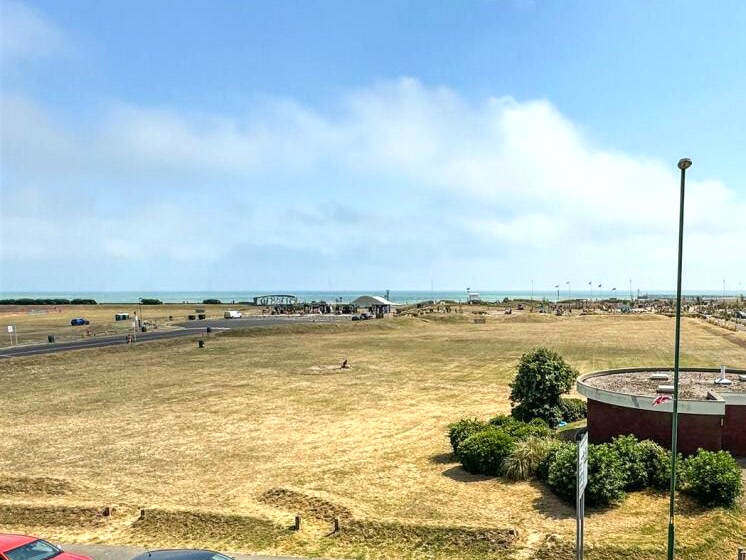 The seafront green and the Channel seen from the flat